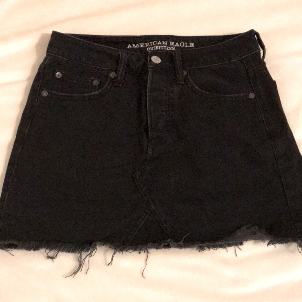 Button fly black jean skirt